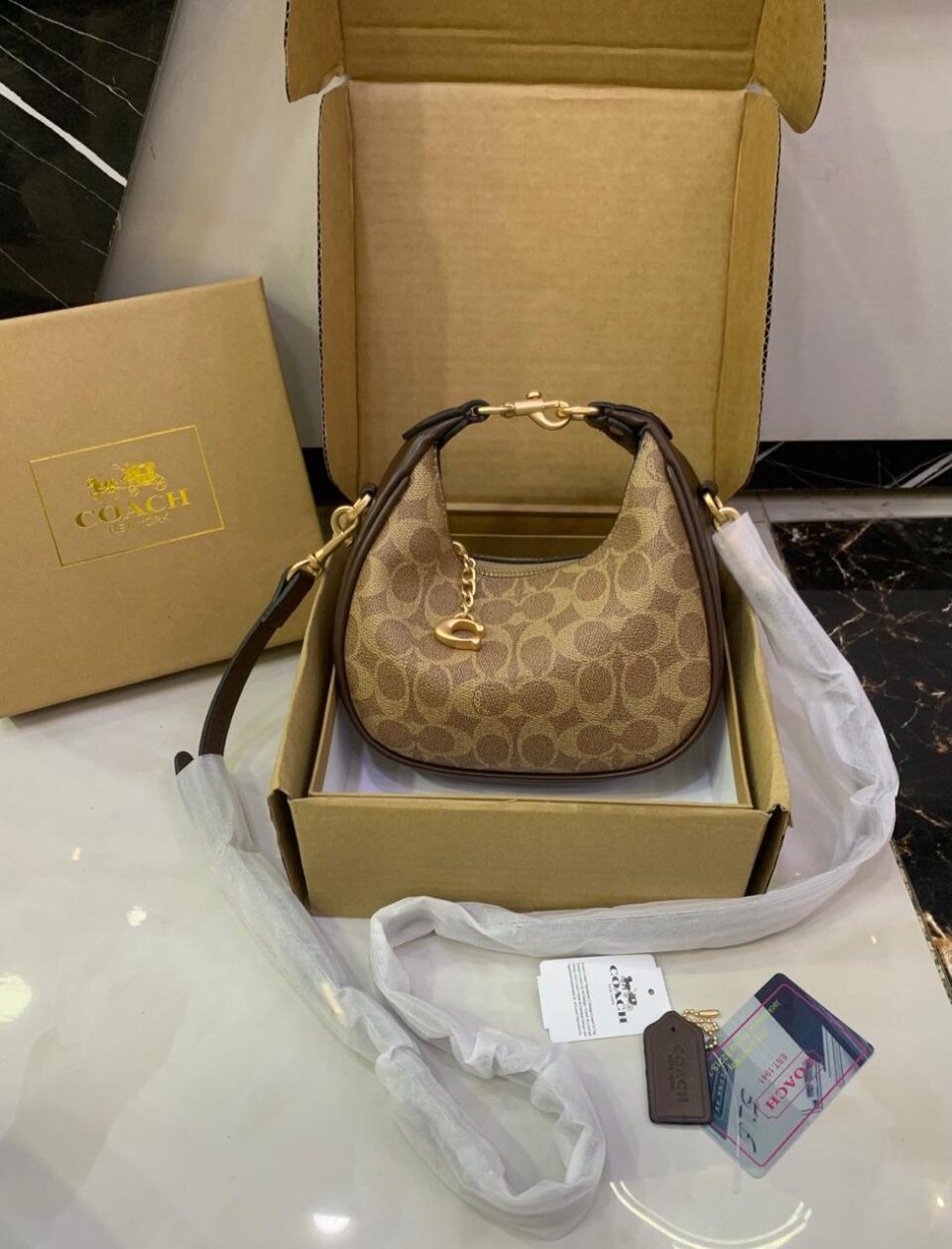 Coach Mini Leather Crescent Shoulder Bag in Signature Canvas