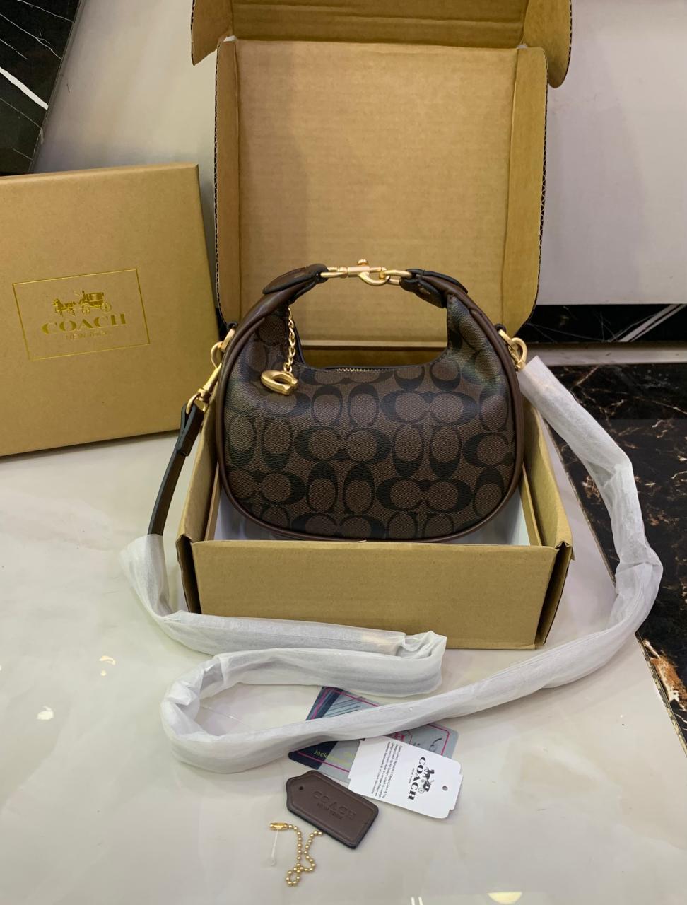 Coach Mini Leather Crescent Shoulder Bag in Signature Canvas