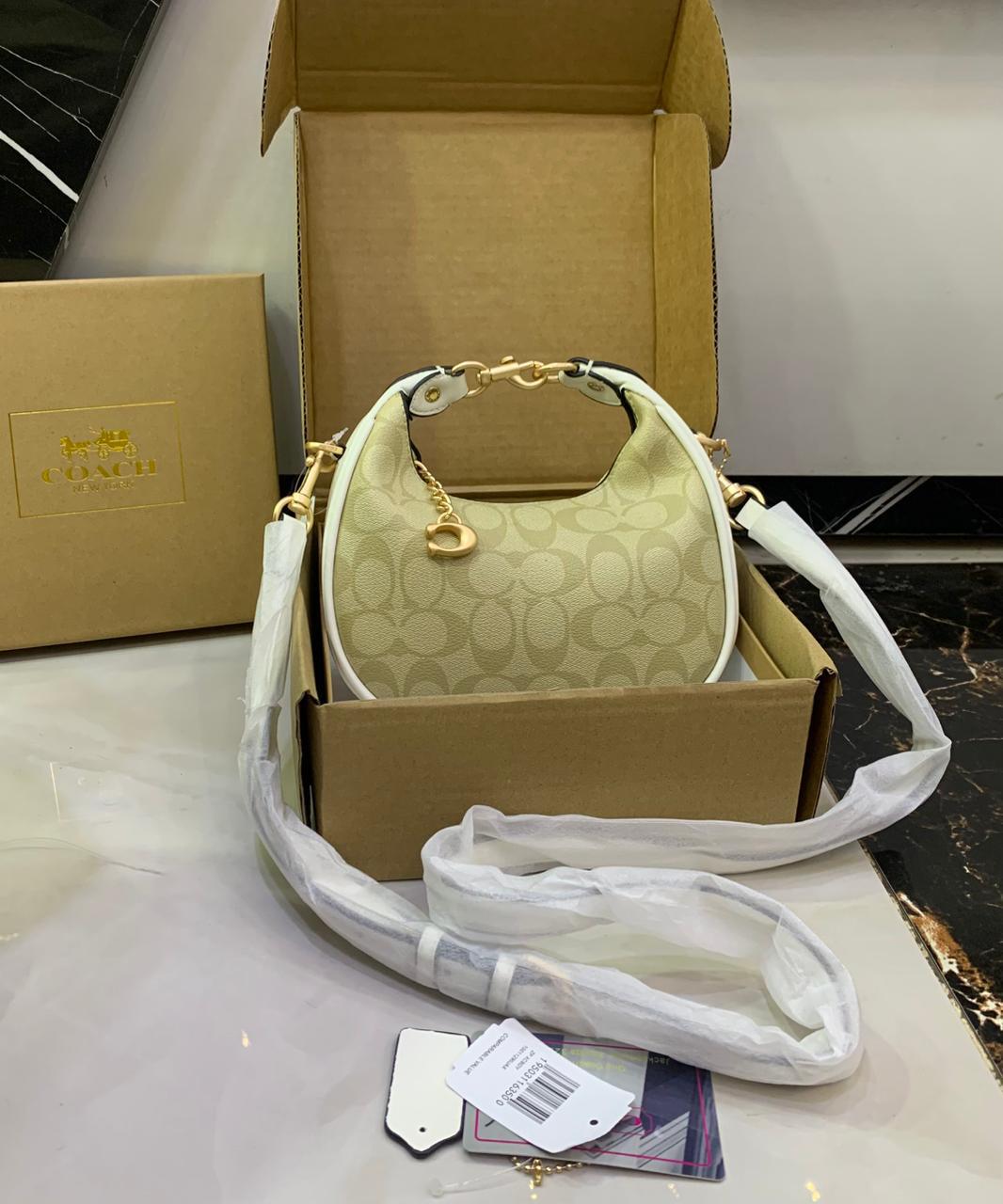 Coach Mini Leather Crescent Shoulder Bag in Signature Canvas